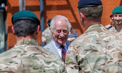 King Charles jokes about being &#039;allowed out of my cage&#039; during Surrey army barracks visit
