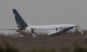 Plane catches fire and skids off runway in Senegal, injuring at least 10 people