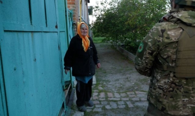 Terror, grief and rising smoke leave streets completely empty - as Ukrainians flee border town&#039;s fiercest attack yet