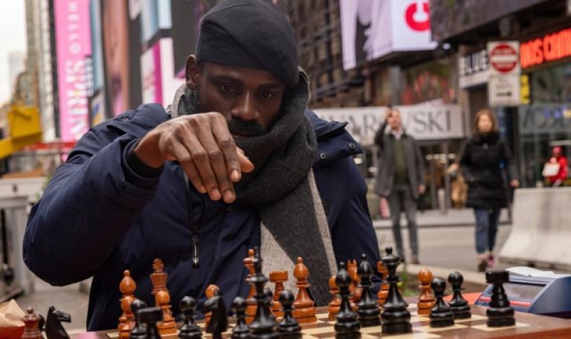 Chess champion plays for marathon 58 hours to break record - and raise cash for child education