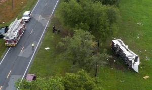 Driver arrested after truck hits farm worker bus, killing eight and injuring 40 in Florida